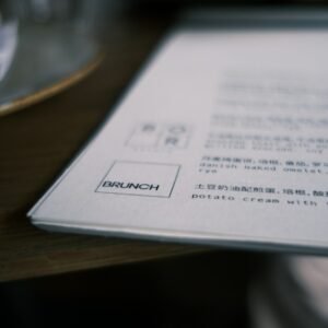 white printer paper on brown wooden table